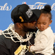 LeBron James of the Cleveland Cavaliers kisses his daughter Zhuri during a press conference following the Cavs’ defeat of the Golden State Warriors 93-89 in Game 7 to win the 2016 NBA Finals June 19, 2016, in Oakland, Calif.
Thearon W. Henderson/Getty Images